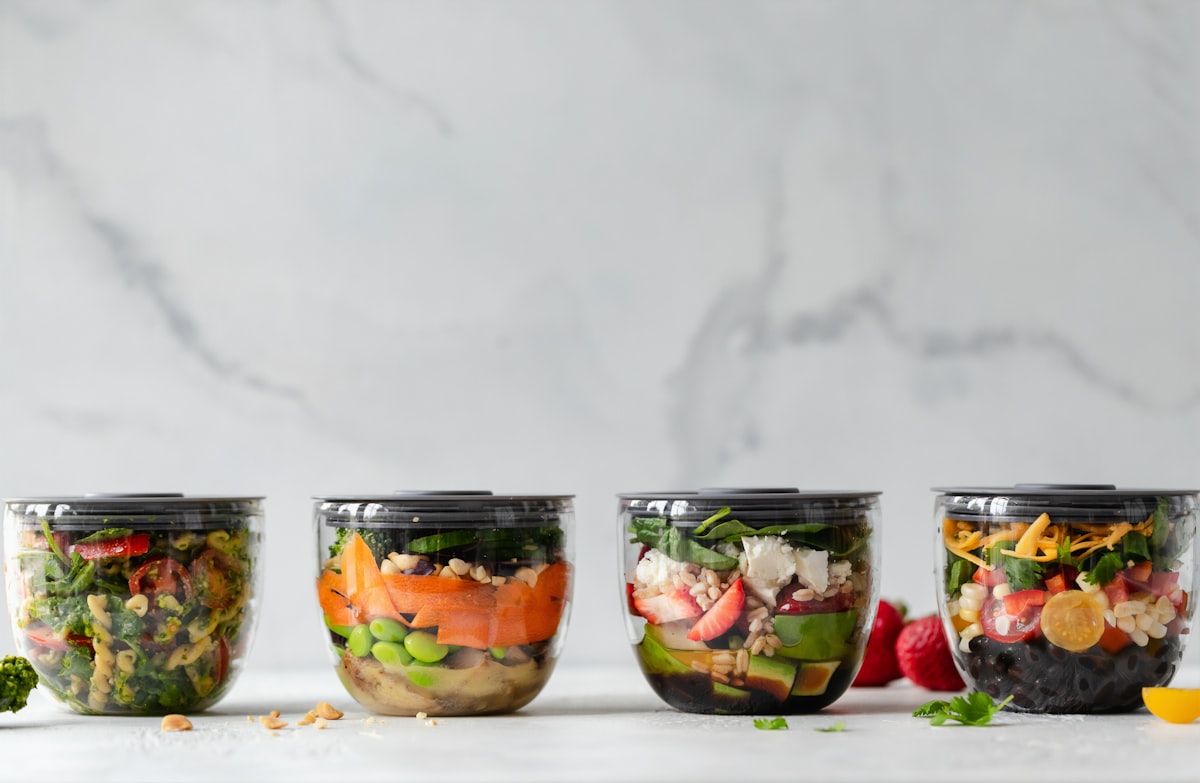 Vegetable portion size guide showing two handfuls of mixed fresh vegetables